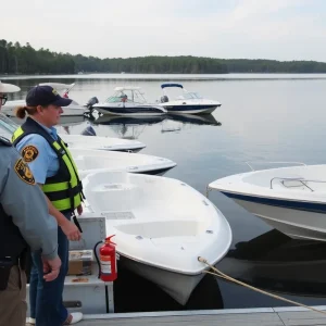 SCDNR officers inspecting boats for safety equipment at a South Carolina lake