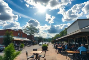 A sunny day in Greenwood, SC with clouds and people at an outdoor café