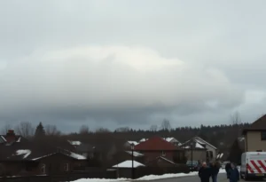 A chilly and cloudy day in Greenwood, SC, with overcast skies and residents bundled up.