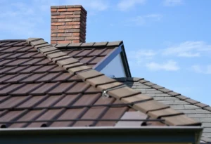 A reinforced roof under clear skies highlighting various roofing materials.