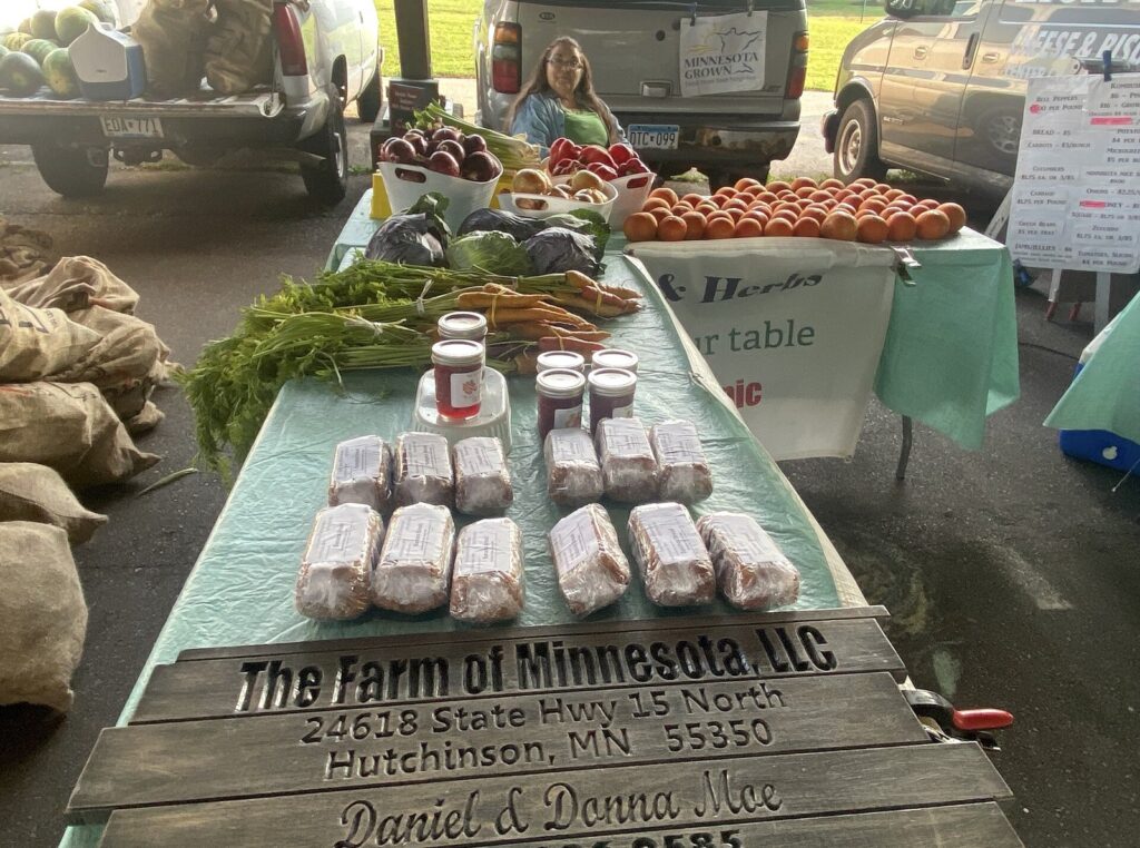 Farmers market stand with produce